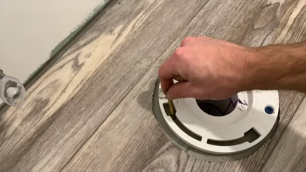 Positioning And Securing The Toilet