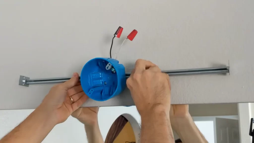 How to Install a Bathroom Light Fixture Without a Junction Box