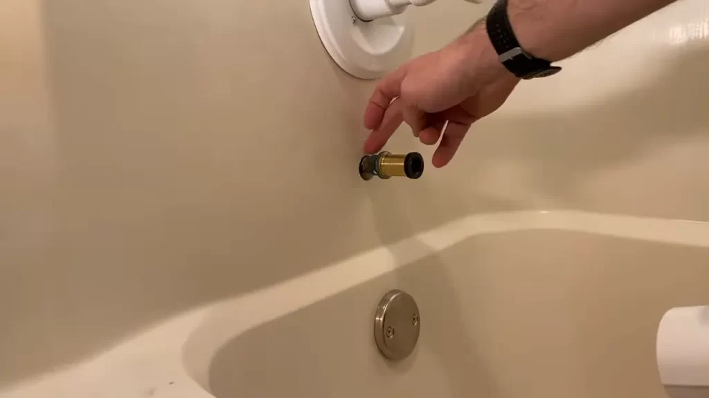 Step 2: Insert The Tub Spout Onto The Pipe Nipple