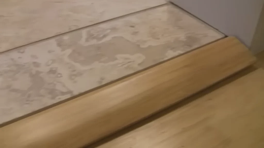 How to Install a Transition Strip from Wood to Tile