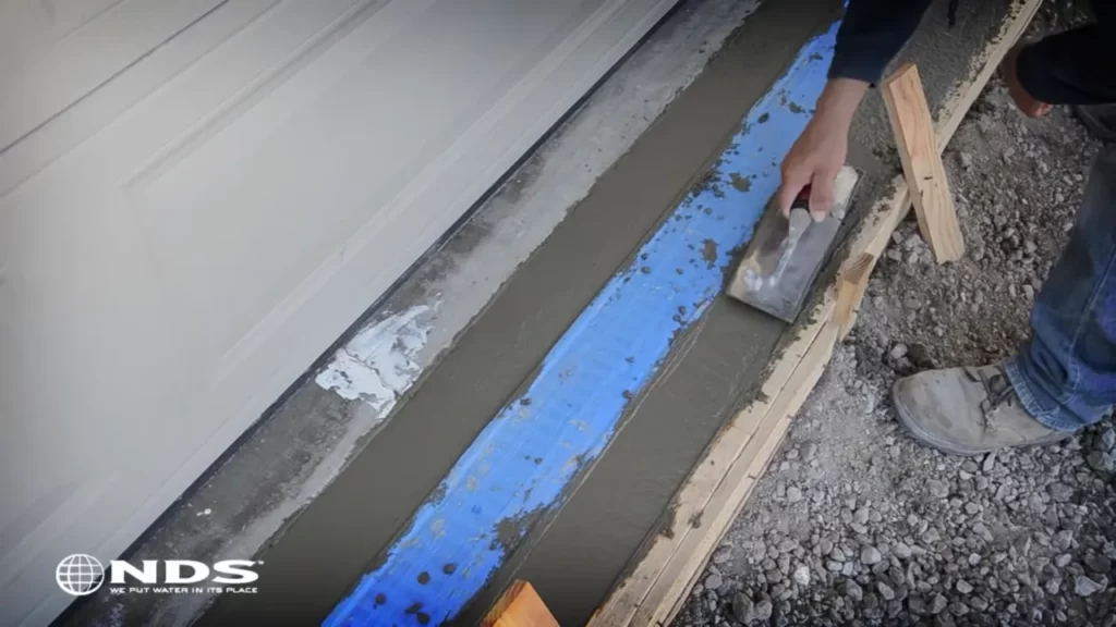 Preparing The Concrete Surface For Channel Drain Installation
