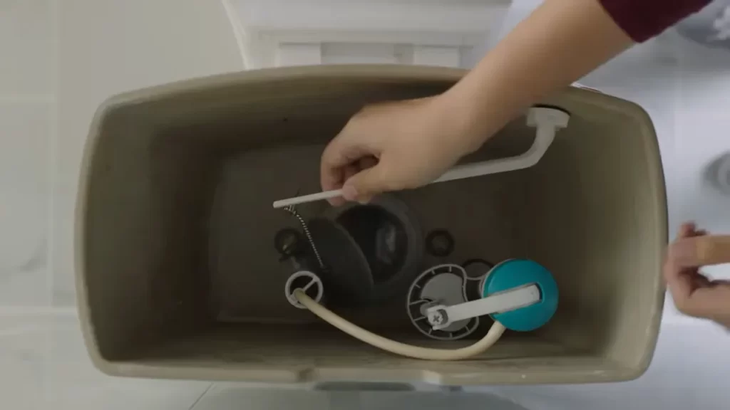 Remove The Old Toilet Handle