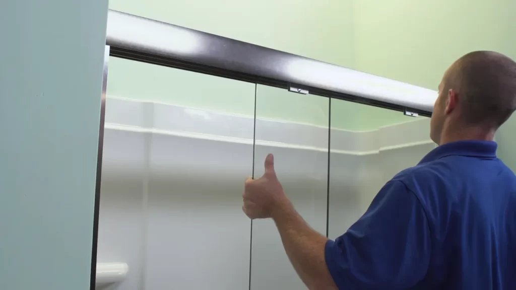 Removing The Existing Shower Curtain Or Sliding Doors